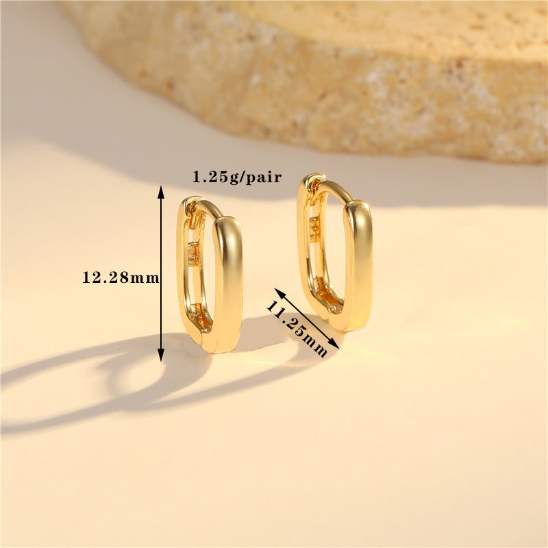 Boucles d'oreilles créoles à grille 4 étoiles ornées de strass 14K GF