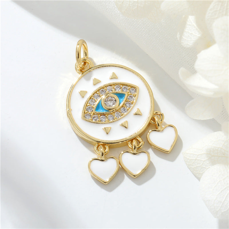 Pendentif de charme à 2 yeux émail époxy strass embelli 14K GF