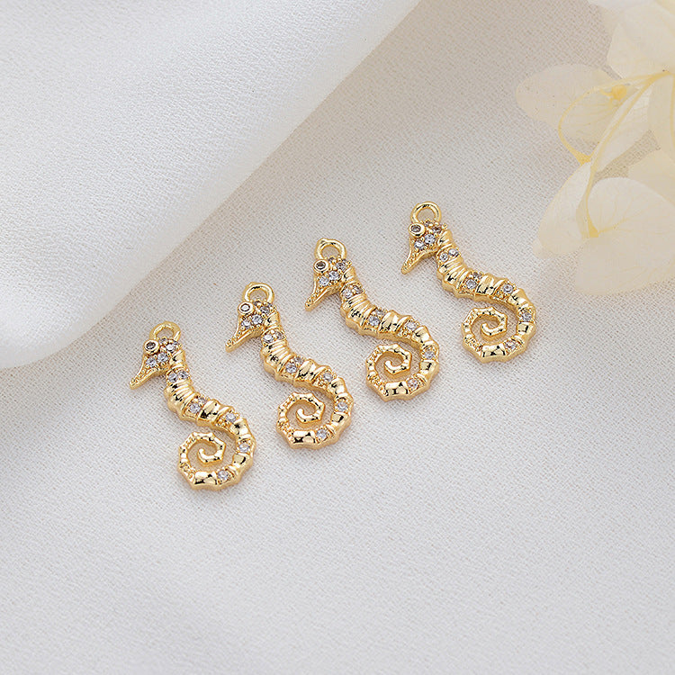 2 Seepferdchen-Charm-Anhänger mit Strassverzierung aus 14-karätigem GF