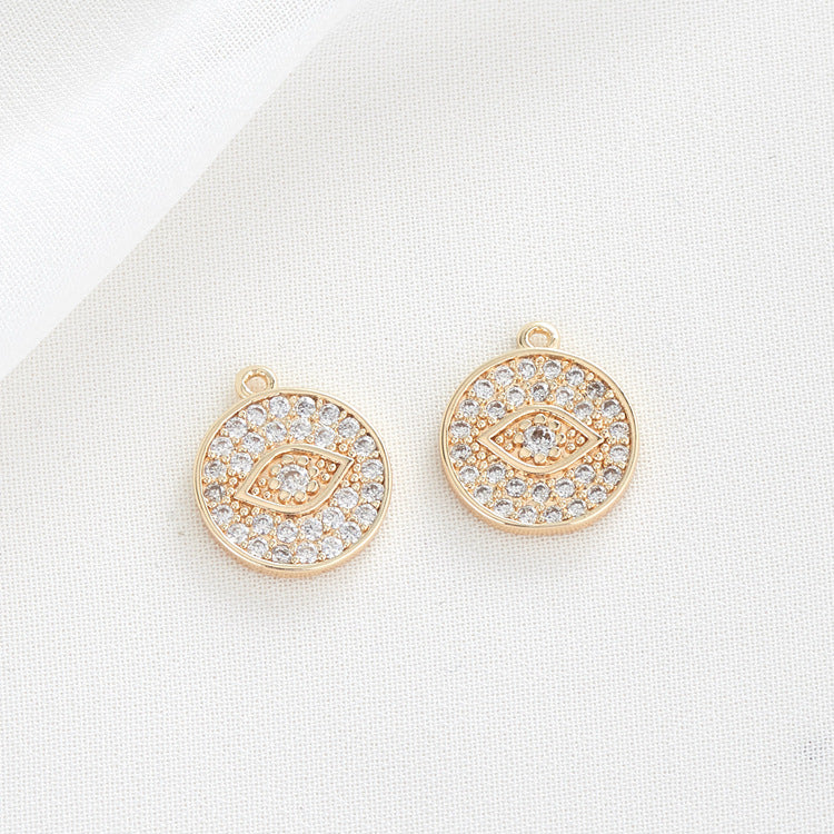 2 runde Augenanhänger mit Strassverzierung aus 14-karätigem GF