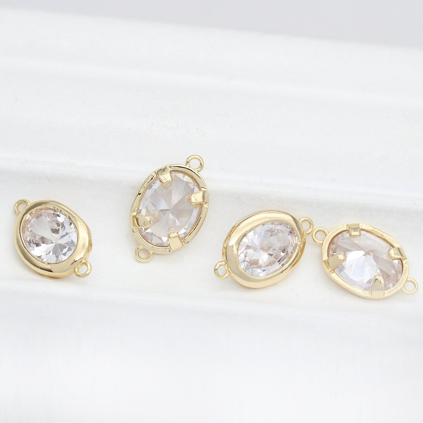 10 doppelt geschlungene ovale Charm-Verbindungsstücke mit Strassverzierung aus 14-karätigem GF