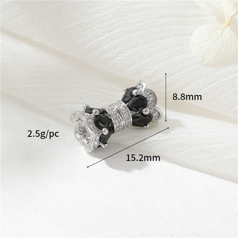 2 fermoirs à vis floraux ornés de strass 14K GF