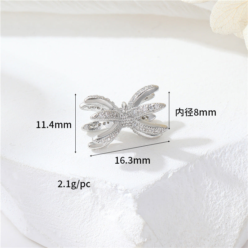 2 fermoirs à vis floraux ornés de strass 14K GF