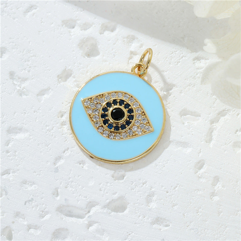 Pendentif de charme à 2 yeux émail époxy strass embelli 14K GF