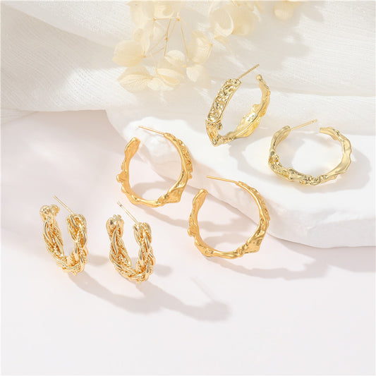 4 schmelzende Halbkreis-Ohrstecker aus 14-karätigem GF