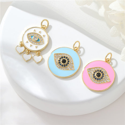 Pendentif de charme à 2 yeux émail époxy strass embelli 14K GF