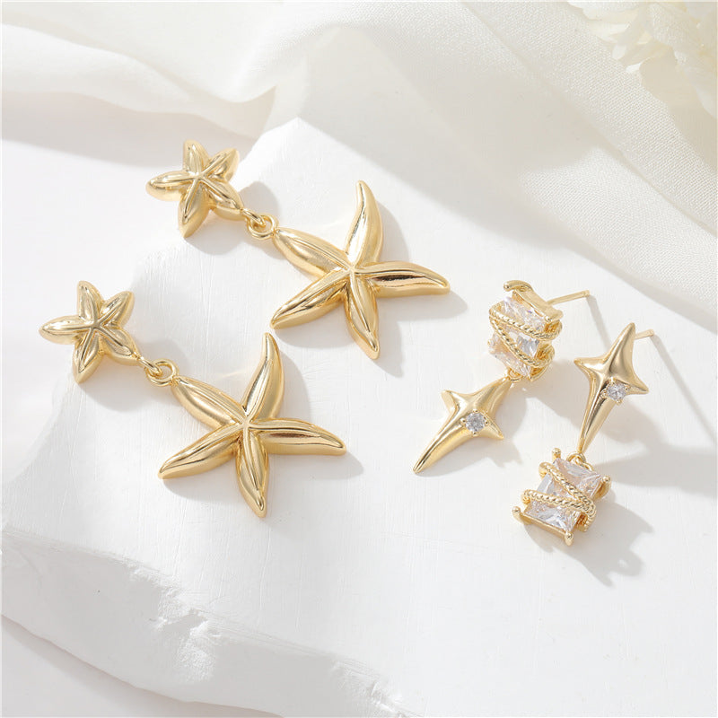 Boucles d'oreilles à tige étoile de mer 4 étoiles, ornées de strass 14K GF