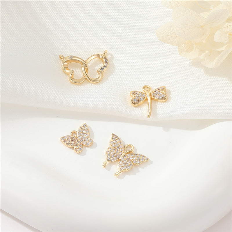 2 pendentifs à breloque papillon ornés de strass 14K GF
