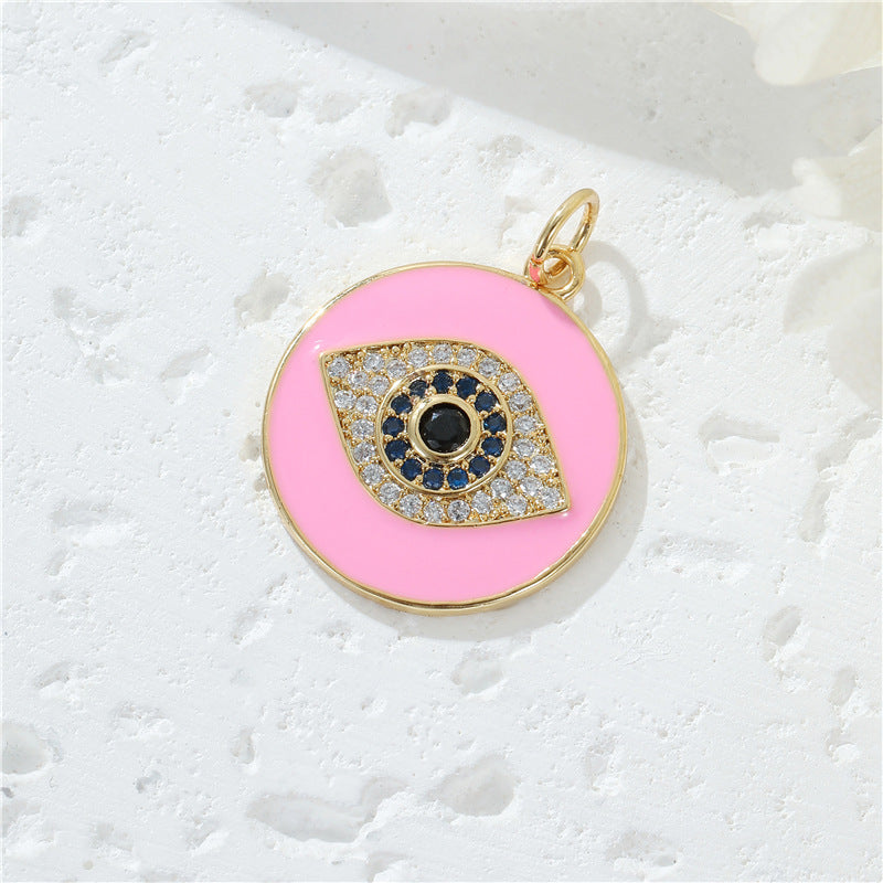 Pendentif de charme à 2 yeux émail époxy strass embelli 14K GF