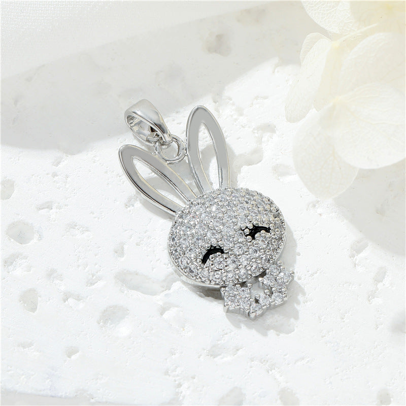 2 pendentifs à breloques lapin ornés de strass 14K GF