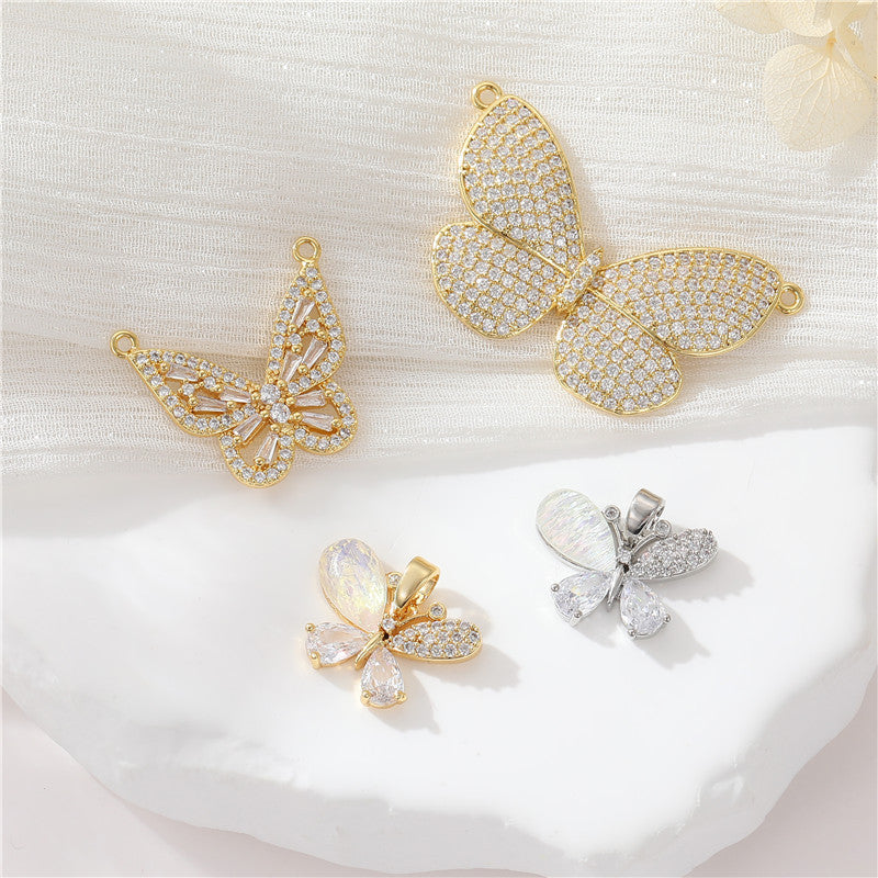 2 pendentifs à breloque papillon ornés de strass 14K GF