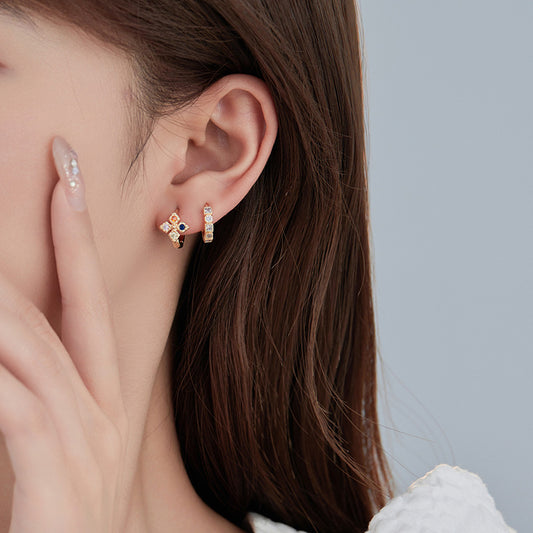 Boucles d'oreilles créoles à grille 4 étoiles ornées de strass 14K GF