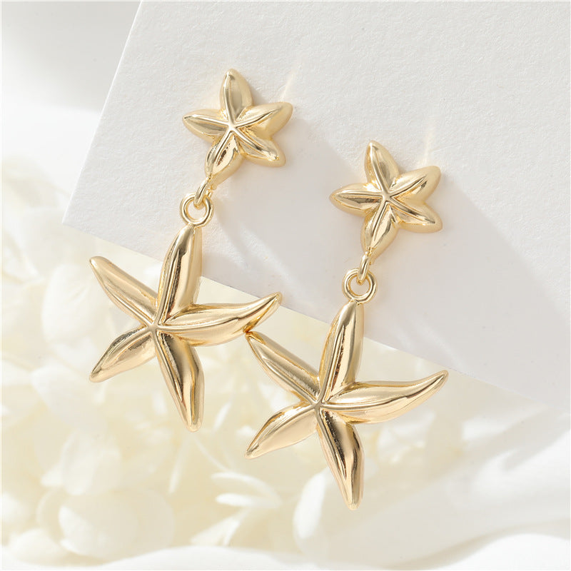 Boucles d'oreilles à tige étoile de mer 4 étoiles, ornées de strass 14K GF