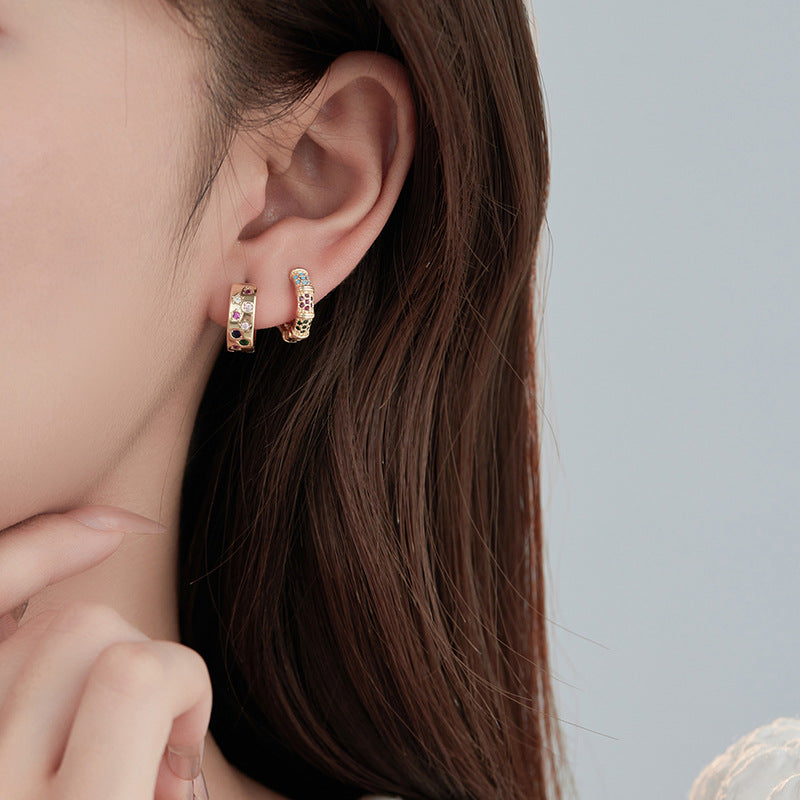 Boucles d'oreilles créoles à grille 4 étoiles ornées de strass 14K GF