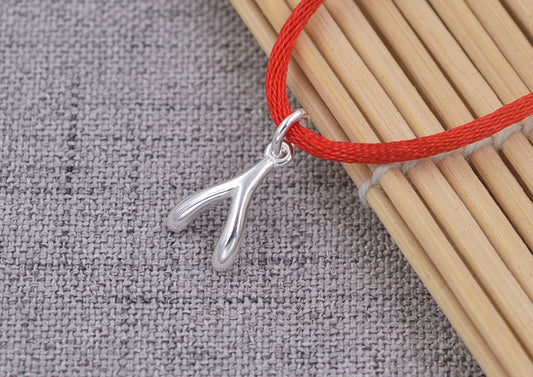 Pendentif à breloque en forme d'os porte-bonheur en argent sterling S925