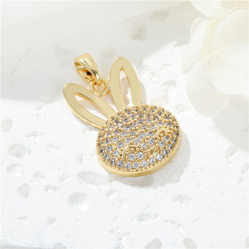 2 pendentifs à breloques lapin ornés de strass 14K GF