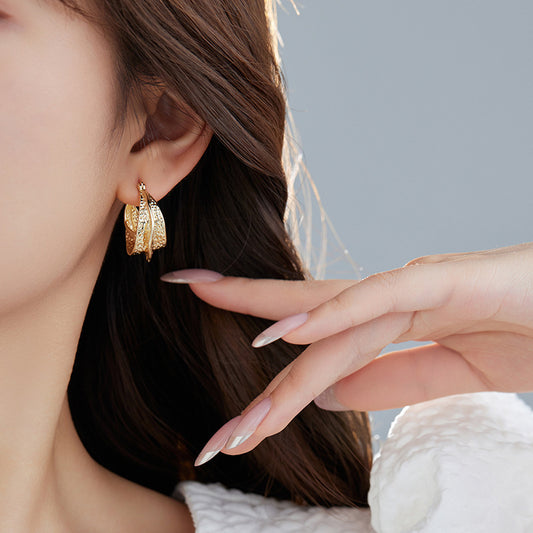 4 klobige hohle Korb-Creolen aus 14-karätigem GF