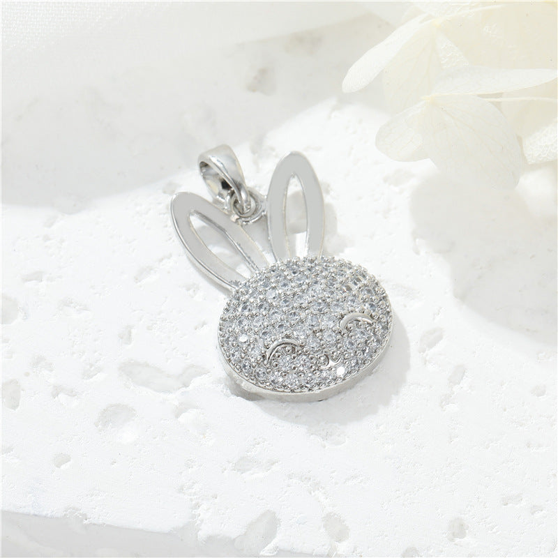 2 pendentifs à breloques lapin ornés de strass 14K GF