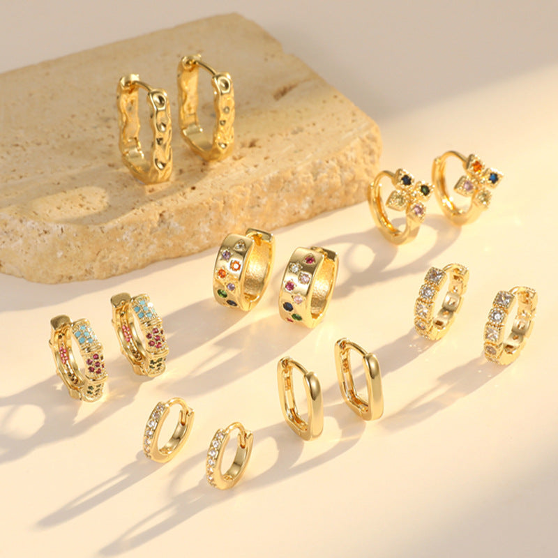 Boucles d'oreilles créoles à grille 4 étoiles ornées de strass 14K GF