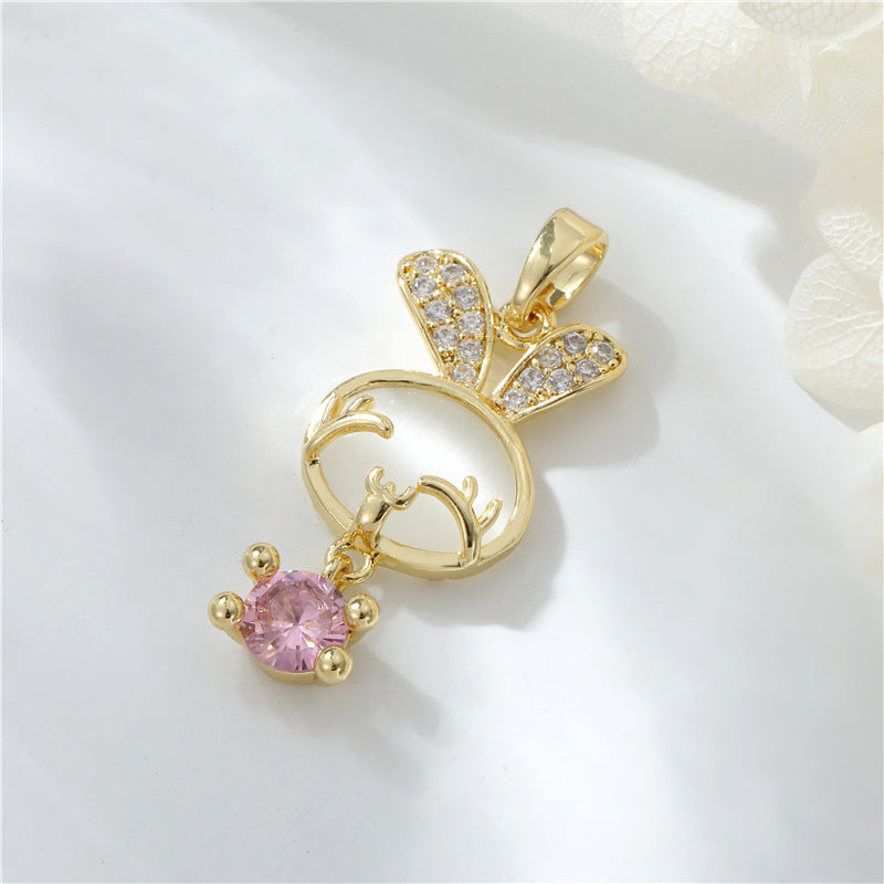2 pendentifs à breloques lapin ornés de strass 14K GF