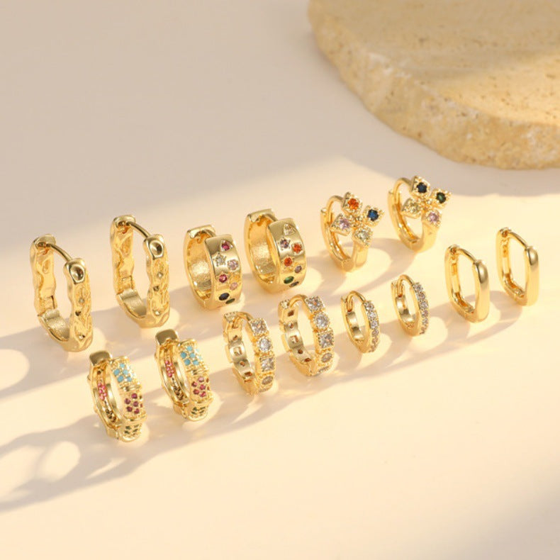 Boucles d'oreilles créoles à grille 4 étoiles ornées de strass 14K GF