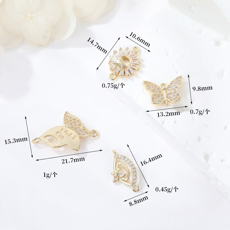2 connecteurs de charme papillon à double boucle ornés de strass 14K GF