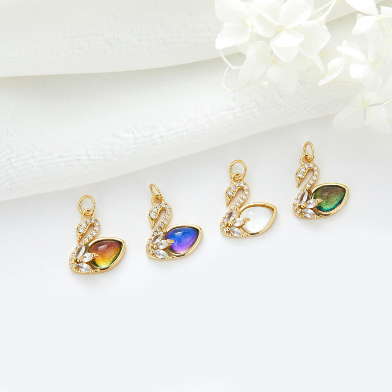 2 Cateye-Steine, Astronaut auf Mond, Rakete, Schwan, Katze, Charm-Anhänger, Harz, Strass, verziert, 14 K GF