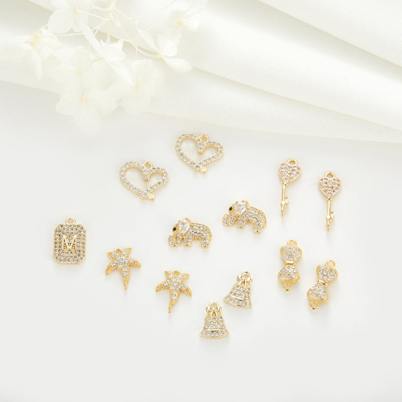 2 clés étoile de mer éléphant nœud papillon coeur cloche pendentif à breloque strass embelli 14K GF