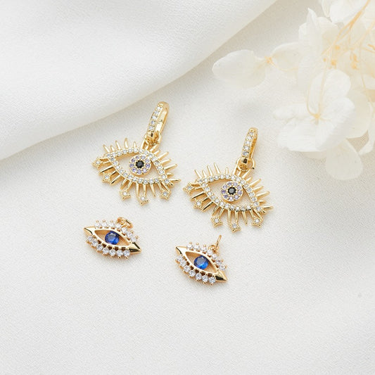 2 Evil Eye Charm-Anhänger mit Strassverzierung aus 14-karätigem GF