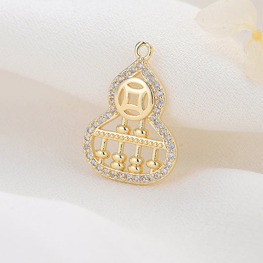 2 hohle Münzkürbis-Charm-Anhänger mit Strassverzierung aus 14-karätigem GF