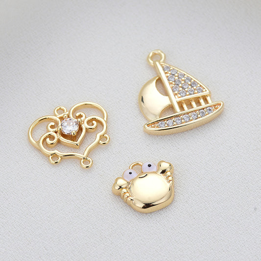 2 Segelboot-Blumenkrabben-Charm-Anhänger, Emaille, Epoxidharz, 14 K GF, Strass verziert