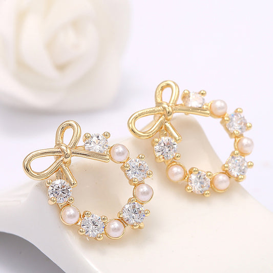 Boucles d'oreilles à tige en forme de cercle avec 4 nœuds papillon, ornées de strass et de perles 14 carats GF