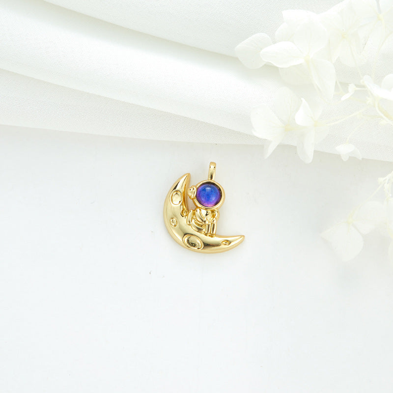 2 Cateye-Steine, Astronaut auf Mond, Rakete, Schwan, Katze, Charm-Anhänger, Harz, Strass, verziert, 14 K GF