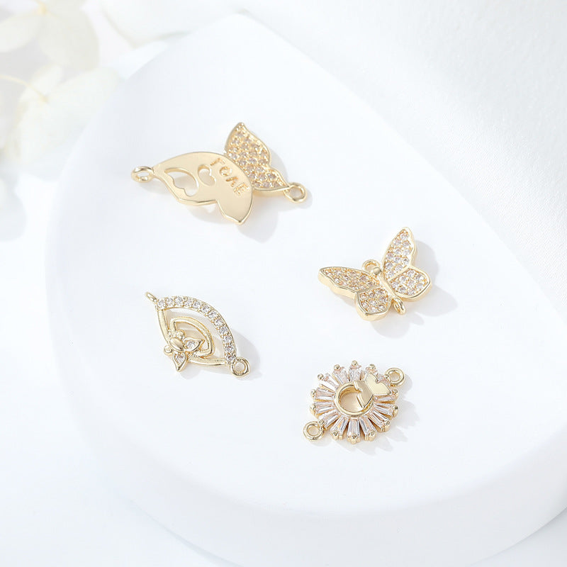 2 connecteurs de charme papillon à double boucle ornés de strass 14K GF