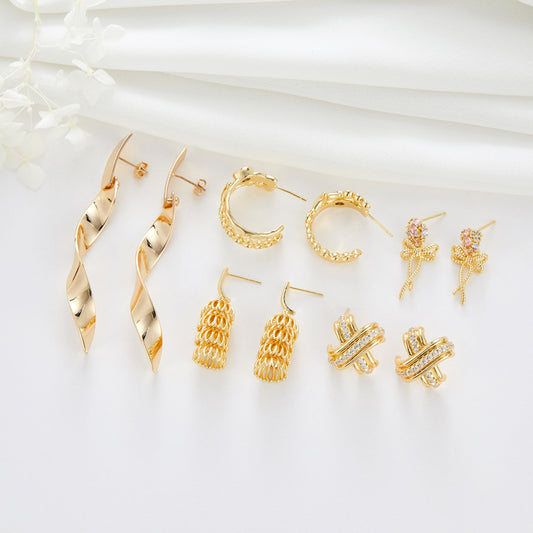 4 Ohrstecker mit floraler Schleife, 14 K GF, mit Strasssteinen verziert