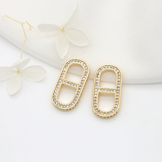 2 Unendlichkeits-Charm-Anhänger mit Strassverzierung aus 14-karätigem GF