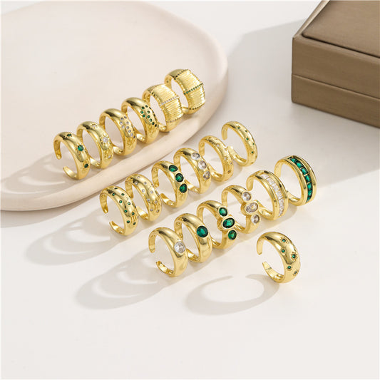 2 Statement-Ringe mit offenem Kreis und Strasssteinen, 14K GF