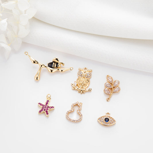 2-Augen-Zweig-Eulenblatt-Kürbis-Seestern-Charm-Anhänger mit Strasssteinen verziert, 14-karätiges GF