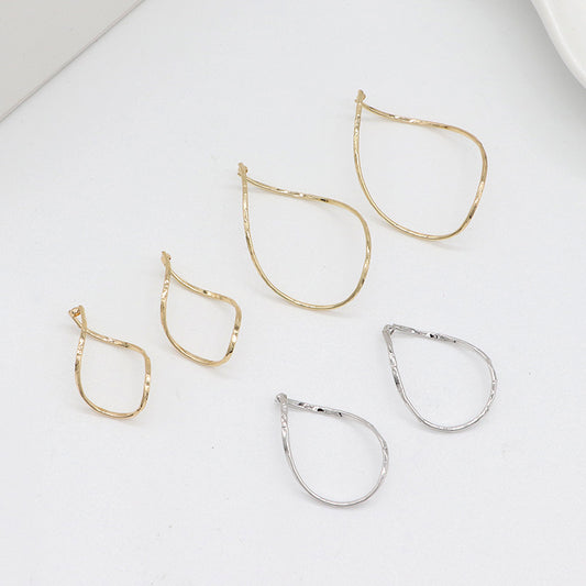 2 gedrehte Wassertropfen-Kreis-Charm-Anhänger aus 14 Karat GF