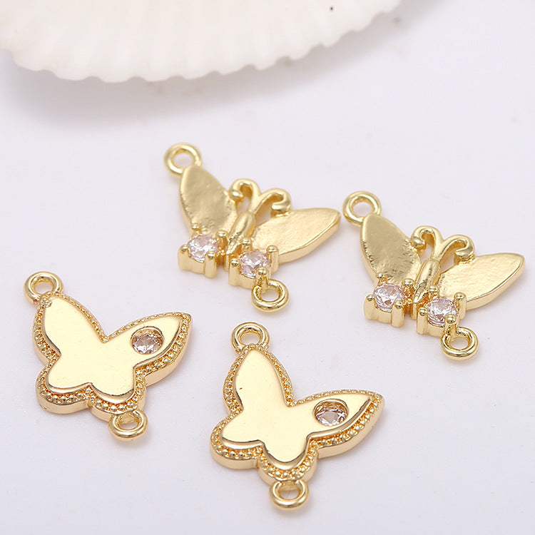 2 connecteurs papillon à double boucle ornés de strass 14K GF
