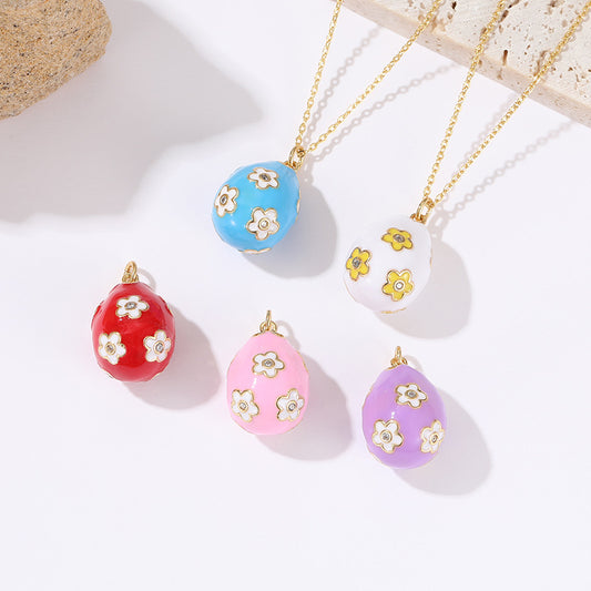 2 Blumen-Ostereier-Charm-Anhänger, Emaille, Epoxid-Strassstein, 14 K GF