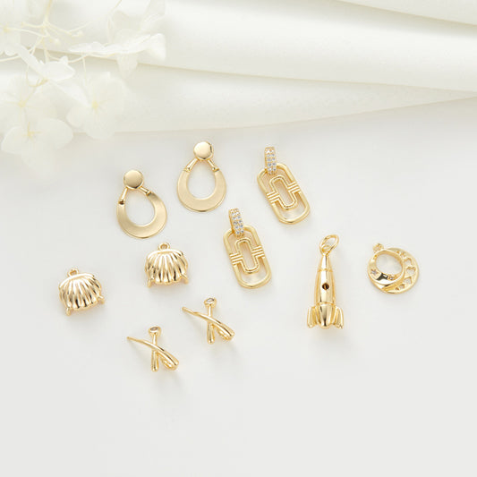 2 Kreuz-längliche Muschel-Raketen-Mond-Charm-Anhänger mit 14-Karat-GF-Strasssteinen verziert