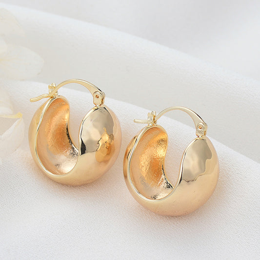 4 klobige gehämmerte Kreis-Creolen aus 14-karätigem GF