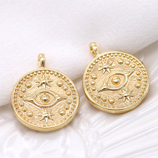 Pendentif à breloque pièce de monnaie à 2 yeux orné de strass 14K GF