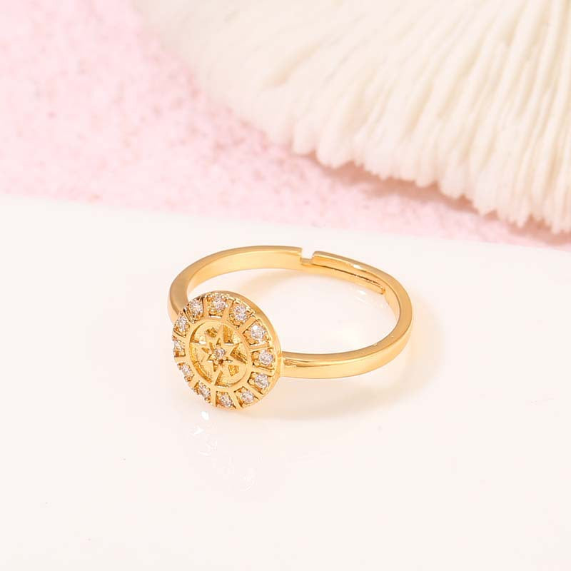 2 Kompass-Statement-Ringe mit offenem Kreis, 14 Karat GF, mit Strasssteinen verziert