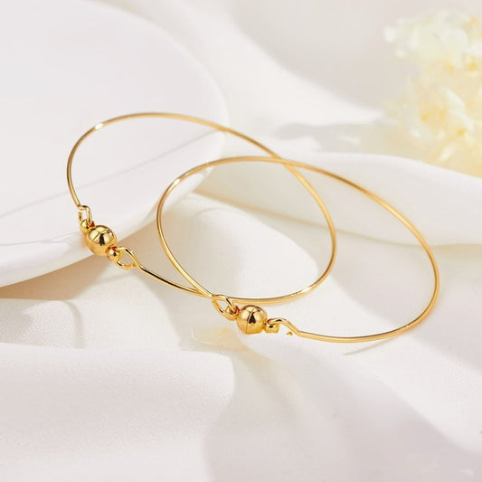 2 Hartdraht-Armbänder aus 14-karätigem GF mit Magnetverschluss