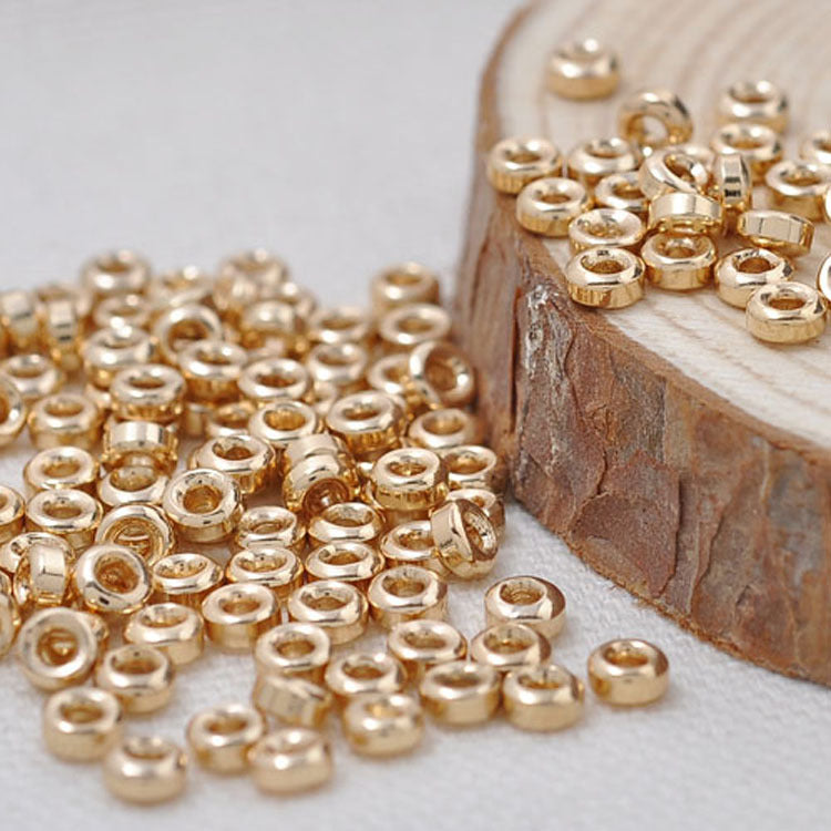 100 minuscules perles rondes plates en cuivre 14 carats GF entretoise de perles de charme