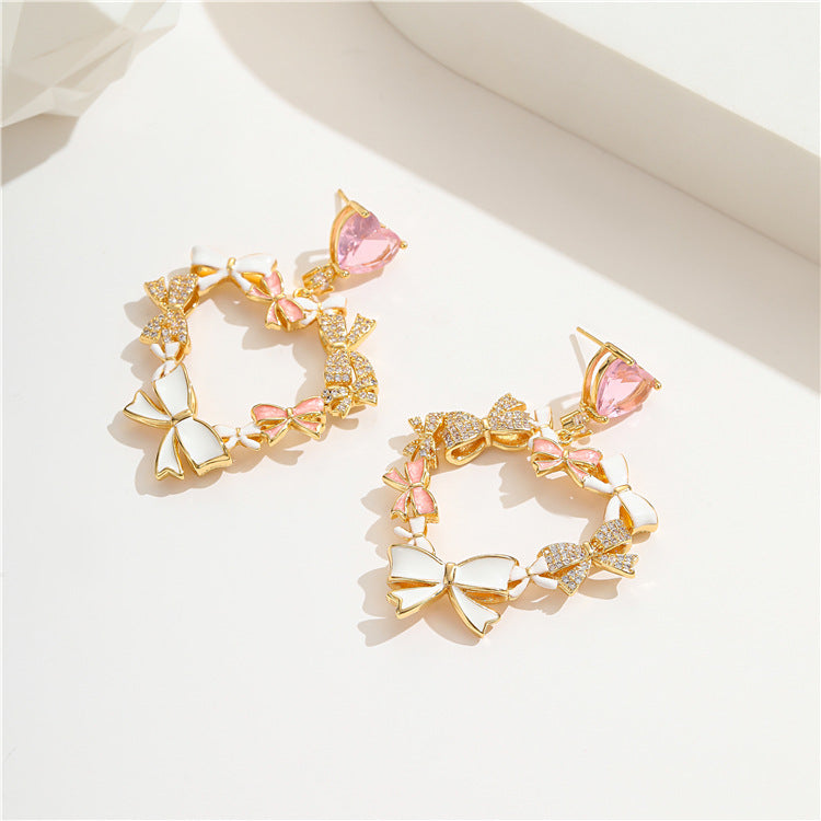 4 boucles d'oreilles à breloques en forme de cœur avec nœud papillon ornées de strass 14K GF