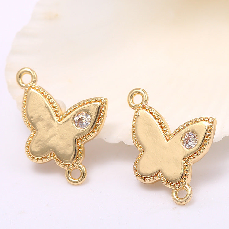 2 connecteurs papillon à double boucle ornés de strass 14K GF
