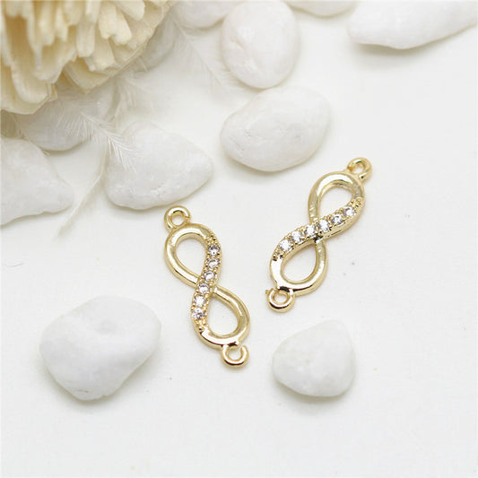 10 Doppelschleifen-Unendlichkeits-Charm-Verbindungsstücke mit Strassverzierung aus 14-karätigem GF